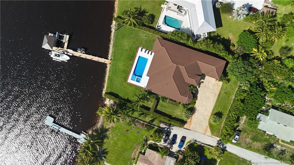 Photo of 1000 NE Wright Avenue, Jensen Beach, FL 34957 (MLS # M20052358)