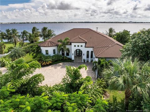 Photo of 1000 NE Wright Avenue, Jensen Beach, FL 34957 (MLS # M20052358)