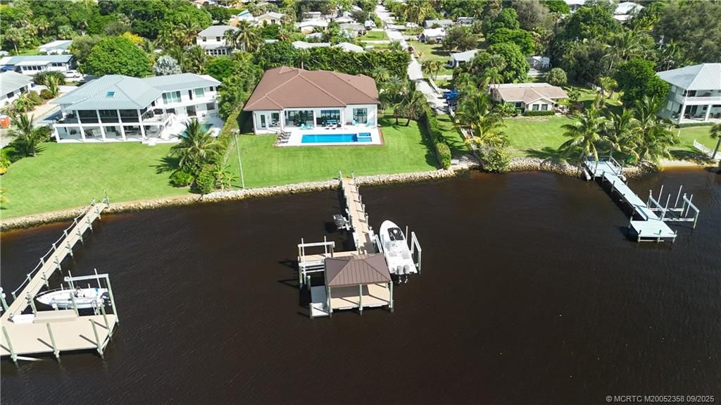 Photo of 1000 NE Wright Avenue, Jensen Beach, FL 34957 (MLS # M20052358)