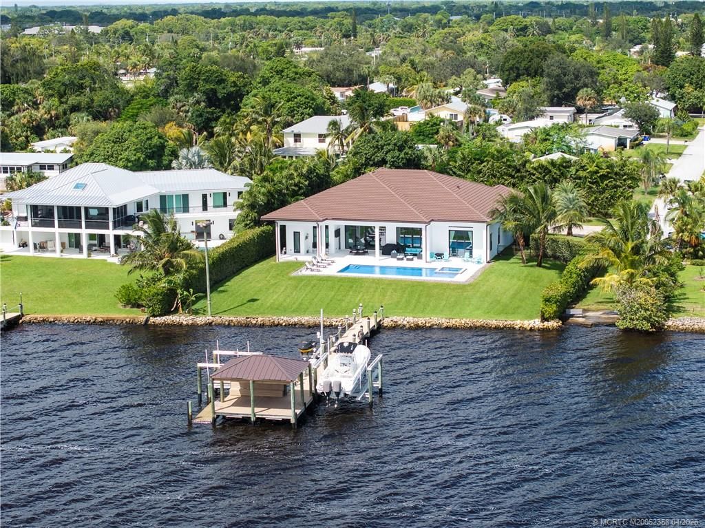 Photo of 1000 NE Wright Avenue, Jensen Beach, FL 34957 (MLS # M20052358)