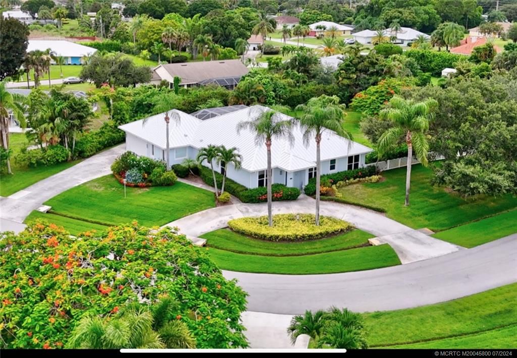 Photo of 1882 SE Adair Road, Port Saint Lucie, FL 34952 (MLS # M20045800)