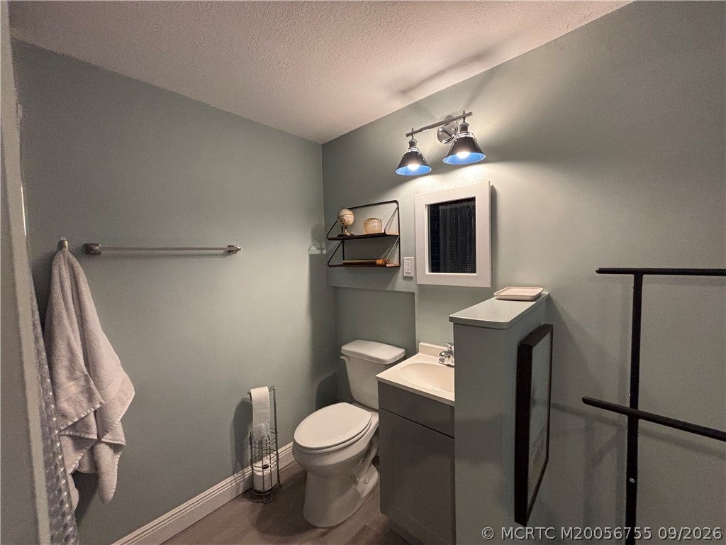 Photo of 1074 NE Orange Avenue, Jensen Beach, FL 34957 (MLS # M20056755)