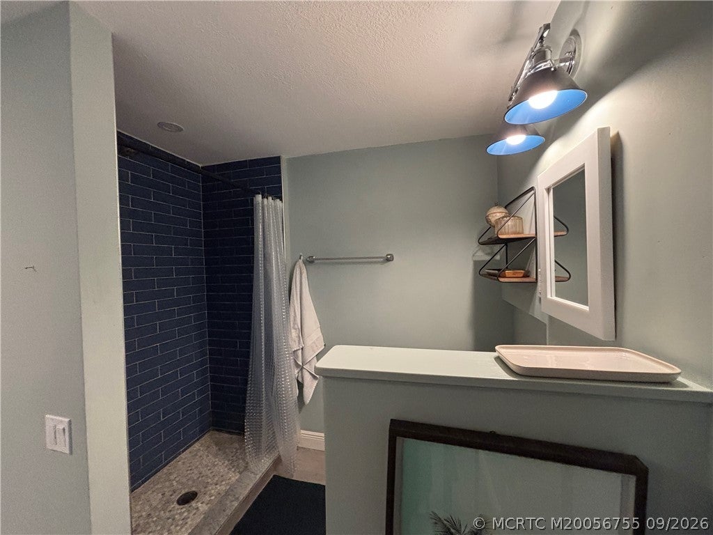 Photo of 1074 NE Orange Avenue, Jensen Beach, FL 34957 (MLS # M20056755)