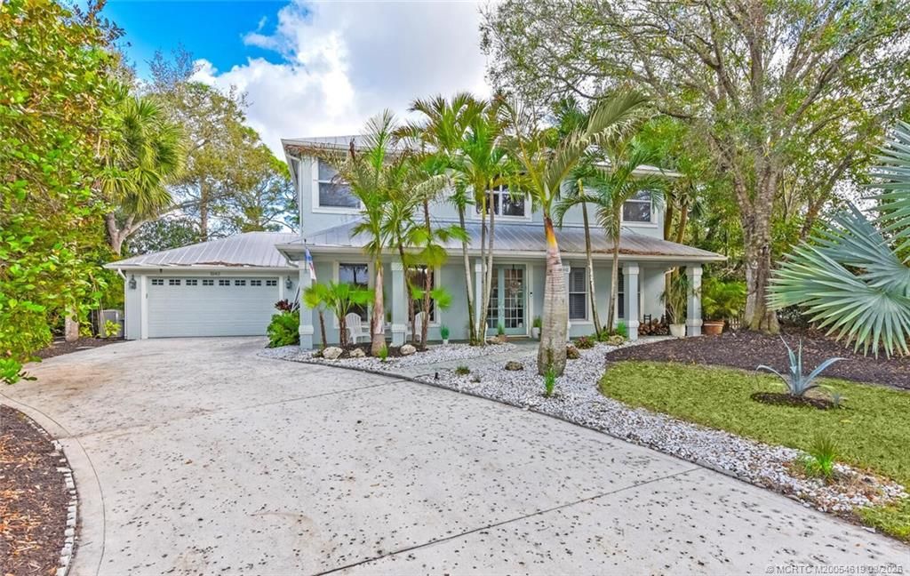 Photo of 1042 SW Lighthouse Drive, Palm City, FL 34990 (MLS # M20054619)