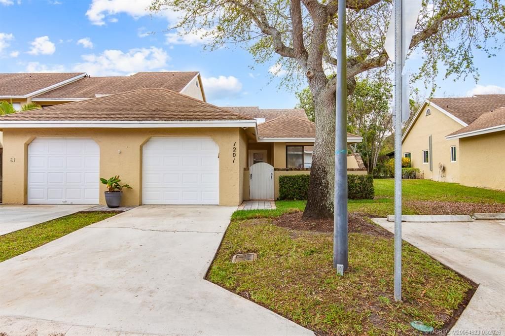 Photo of 1201 Maplewood Drive, Greenacres, FL 33415 (MLS # M20054923)
