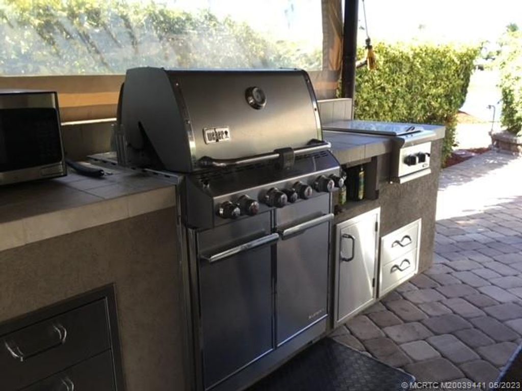 Photo of 441 NW Sandtrap Lane, Port Saint Lucie, FL 34986 (MLS # M20039441)