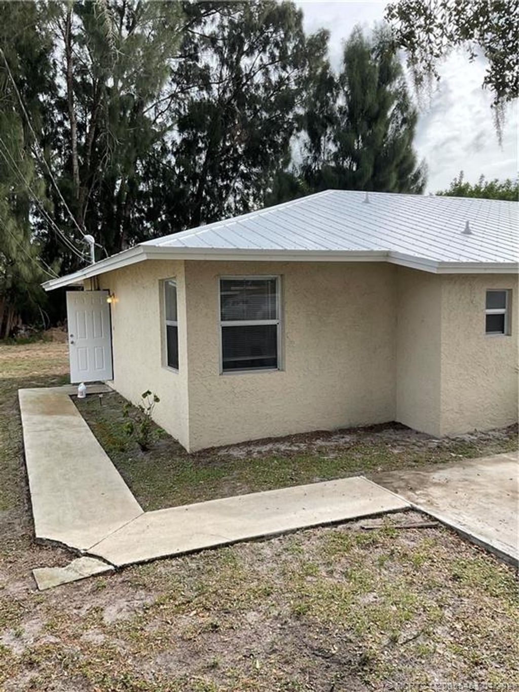 Photo of 402 S 14th Street #A, Fort Pierce, FL 34950 (MLS # M20055461)
