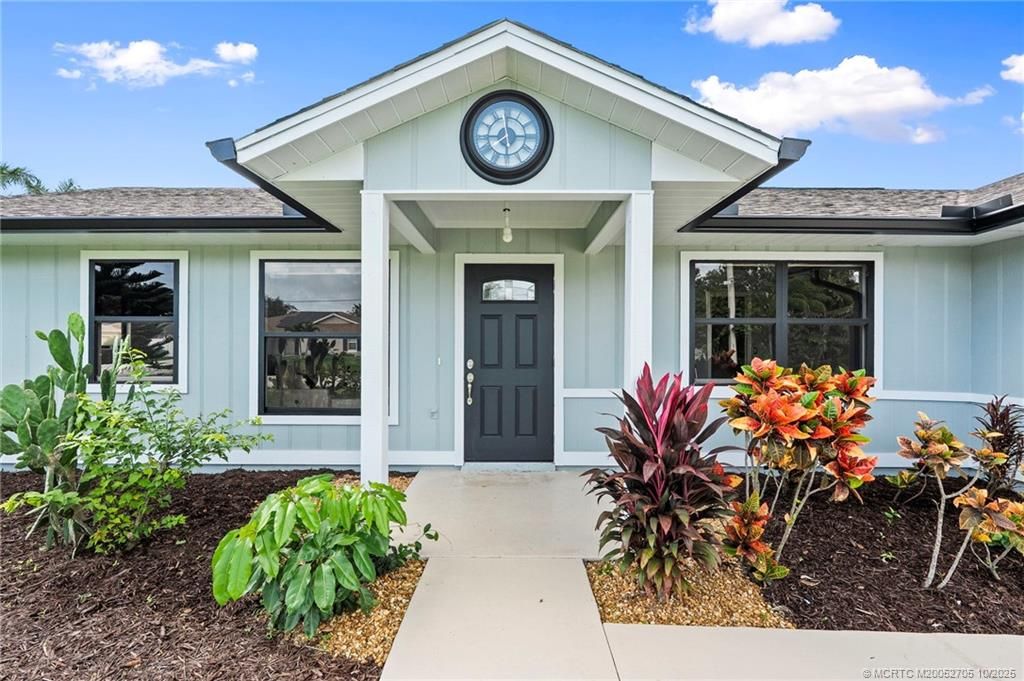 Photo of 452 SW Todd Avenue, Port Saint Lucie, FL 34983 (MLS # M20052705)