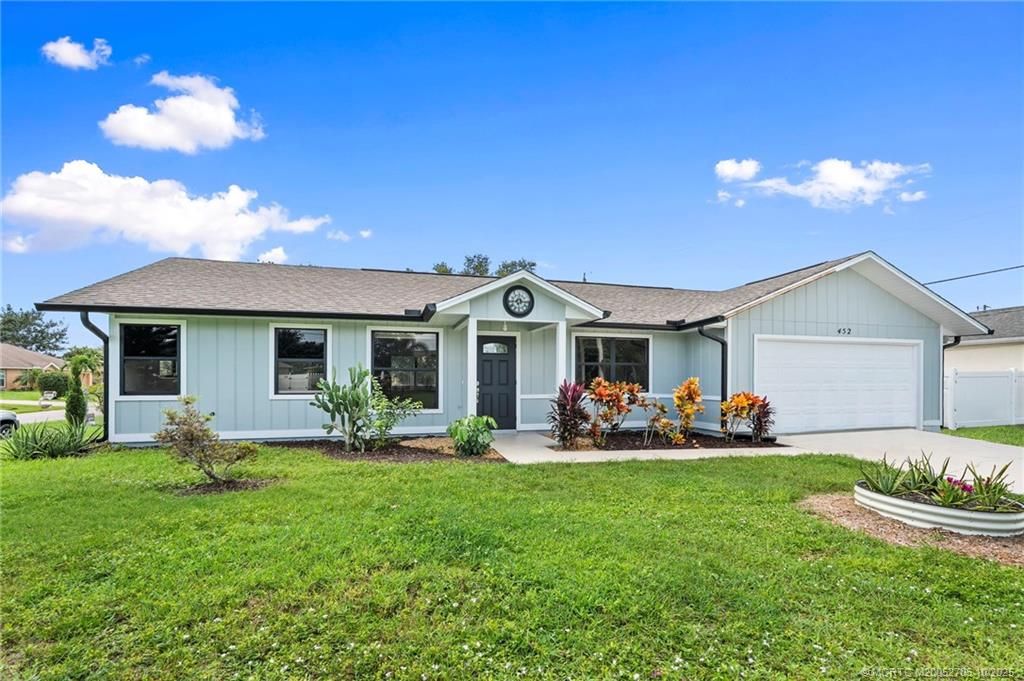 Photo of 452 SW Todd Avenue, Port Saint Lucie, FL 34983 (MLS # M20052705)