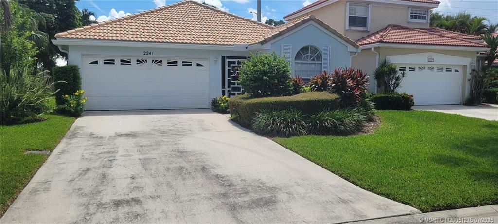Photo of 2241 SW Olympic Club Terrace, Palm City, FL 34990 (MLS # M20051275)