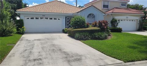 Photo of 2241 SW Olympic Club Terrace, Palm City, FL 34990 (MLS # M20051275)