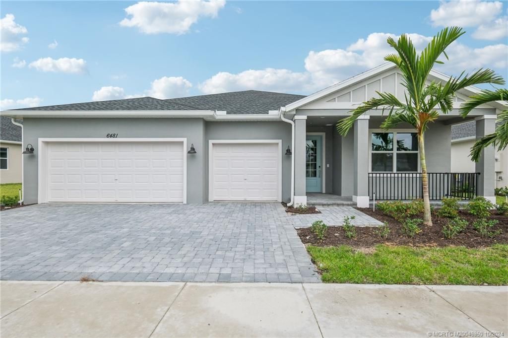 Photo of 6481 NW Cloverdale Avenue, Port Saint Lucie, FL 34987 (MLS # M20046950)