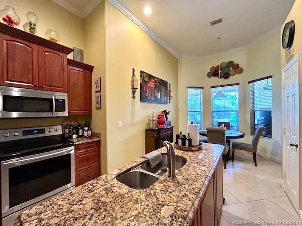 Photo of 2442 SW Mercer Street, Port Saint Lucie, FL 34984 (MLS # M20045232)