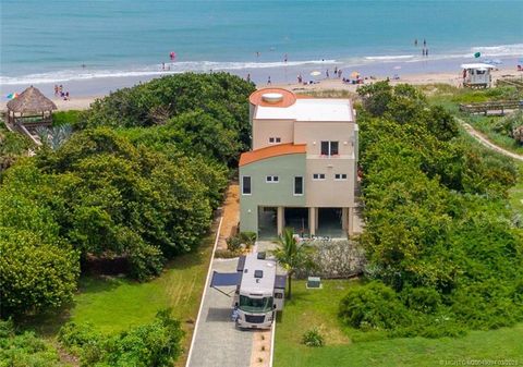 Photo of 10330 S Ocean Drive, Hutchinson Island, FL 34957 (MLS # M20049094)