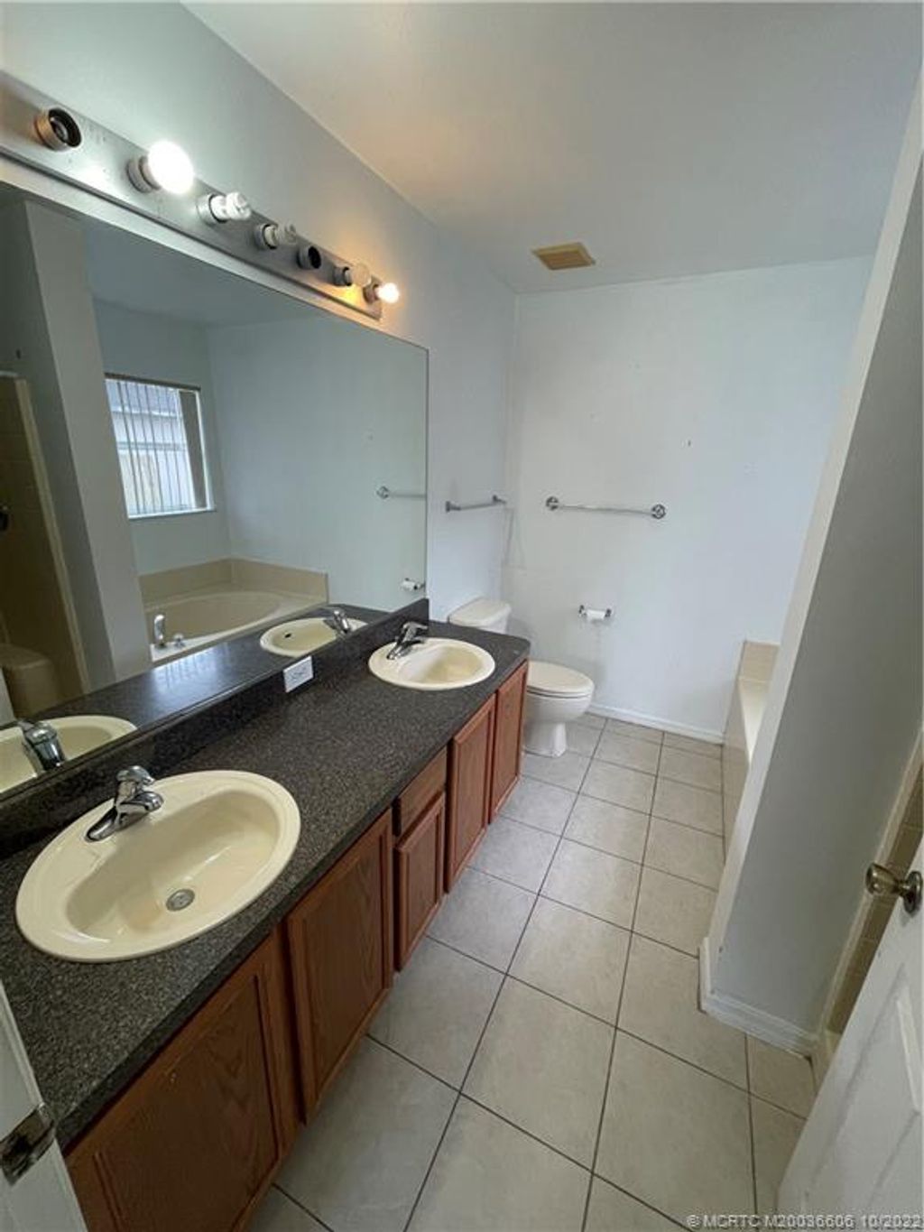 Photo of 1752 SW Angelo Street, Port Saint Lucie, FL 34953 (MLS # M20036606)