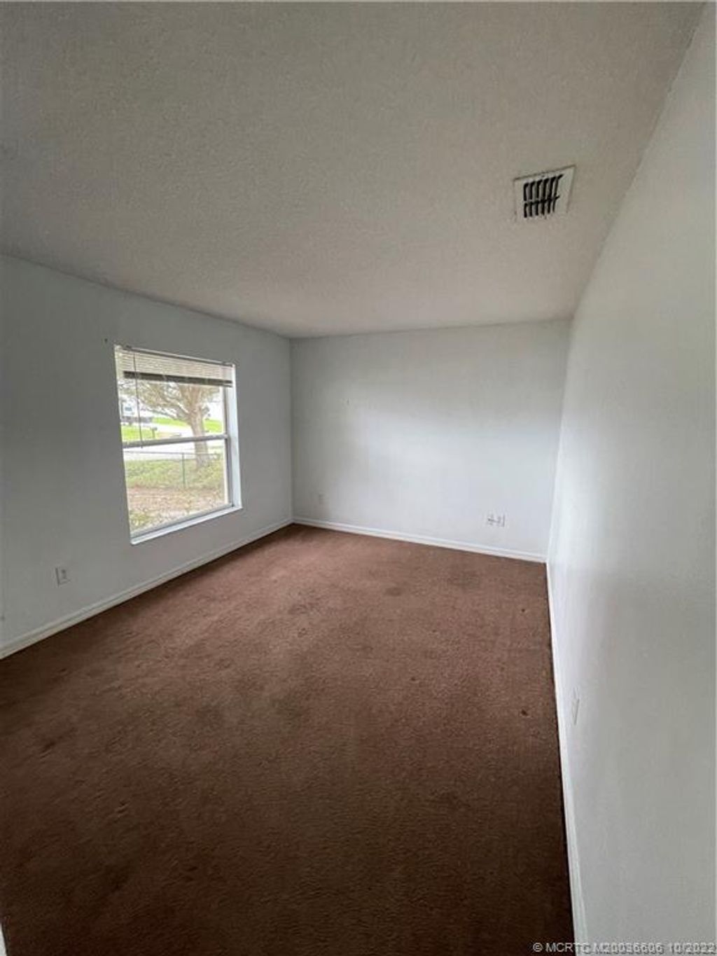 Photo of 1752 SW Angelo Street, Port Saint Lucie, FL 34953 (MLS # M20036606)