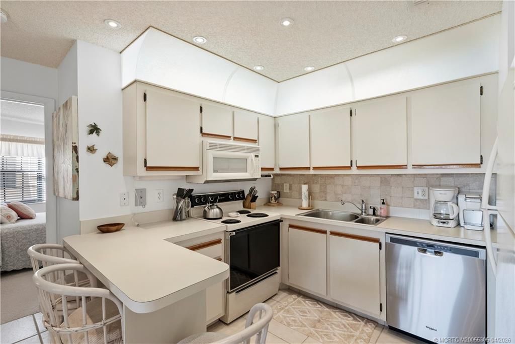 Photo of 2013 NE Collins Circle #4-60, Jensen Beach, FL 34957 (MLS # M20055305)