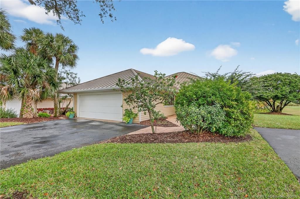 Photo of 5253 SE Club Way, Stuart, FL 34997 (MLS # M20054040)