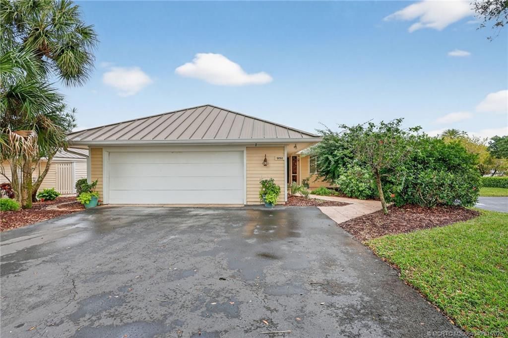 Photo of 5253 SE Club Way, Stuart, FL 34997 (MLS # M20054040)