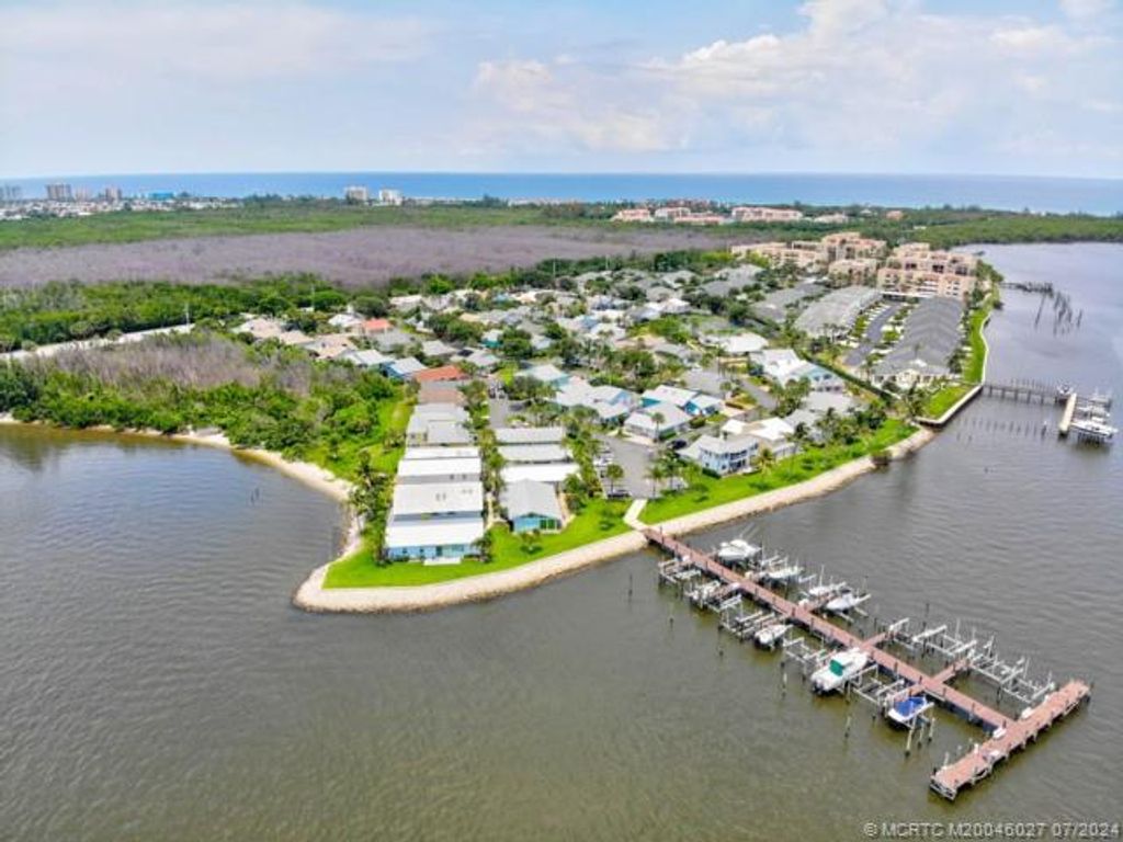 Photo of 3941 NE Breakwater Drive, Jensen Beach, FL 34957 (MLS # M20046027)