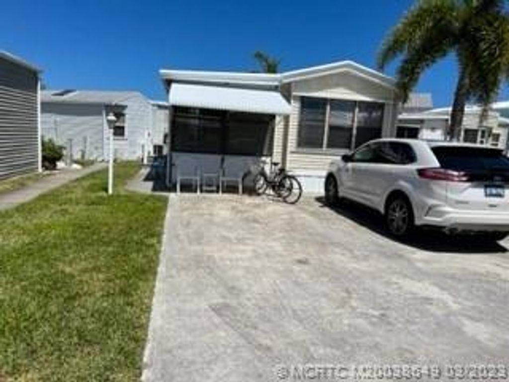 Photo of 327 Nettles Boulevard, Jensen Beach, FL 34957 (MLS # M20038649)