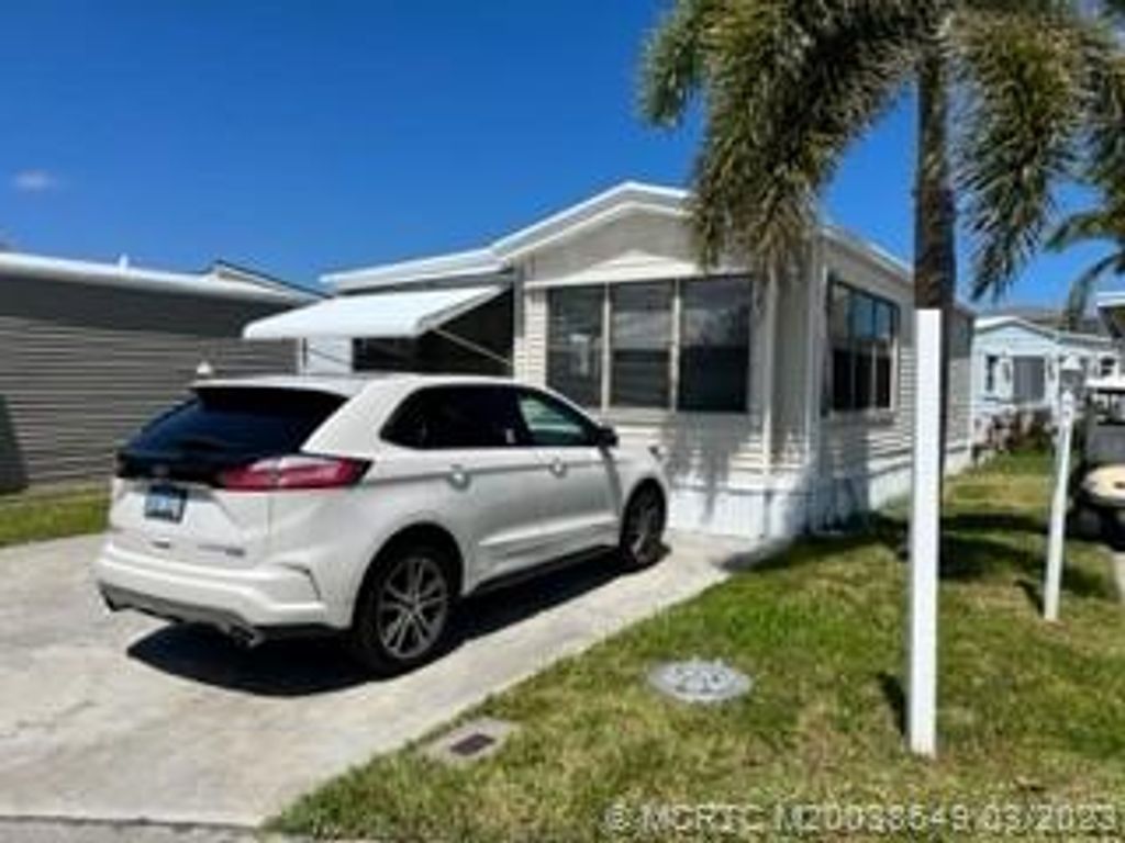 Photo of 327 Nettles Boulevard, Jensen Beach, FL 34957 (MLS # M20038649)
