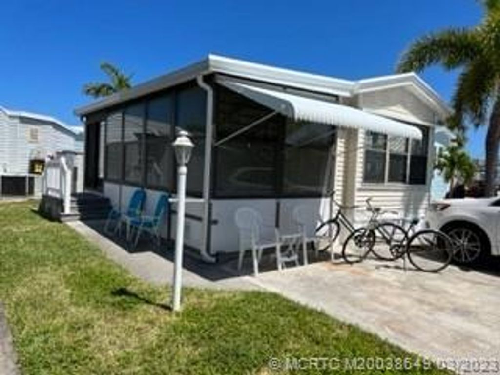 Photo of 327 Nettles Boulevard, Jensen Beach, FL 34957 (MLS # M20038649)