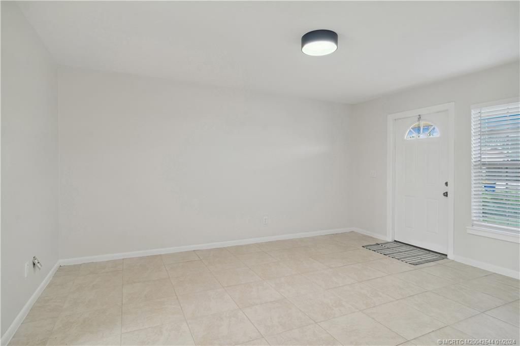 Photo of 2290 NE Rustic Way, Jensen Beach, FL 34957 (MLS # M20042544)