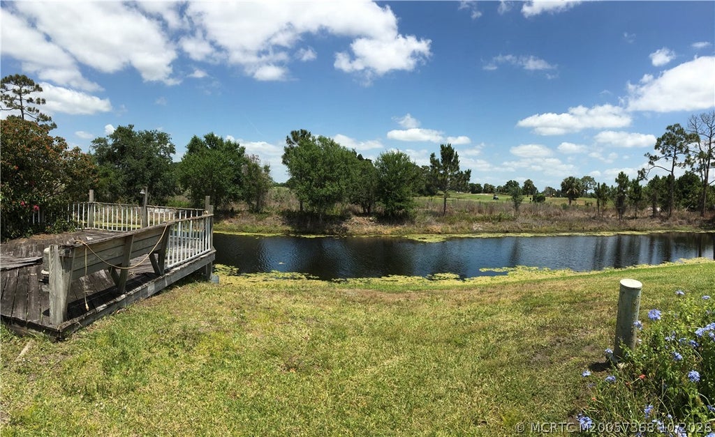 Photo of 14301 SW Divot Drive #G-33, Indiantown, FL 34956 (MLS # M20057368)