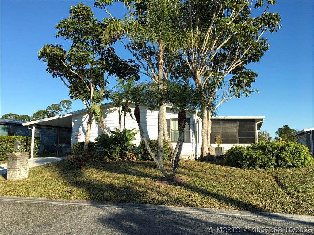 Photo of 14301 SW Divot Drive #G-33, Indiantown, FL 34956 (MLS # M20057368)