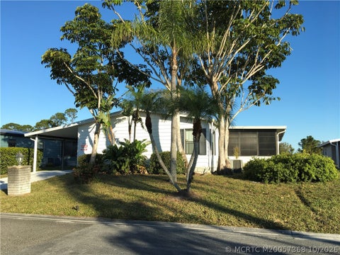 Photo of 14301 SW Divot Drive #G-33, Indiantown, FL 34956 (MLS # M20057368)