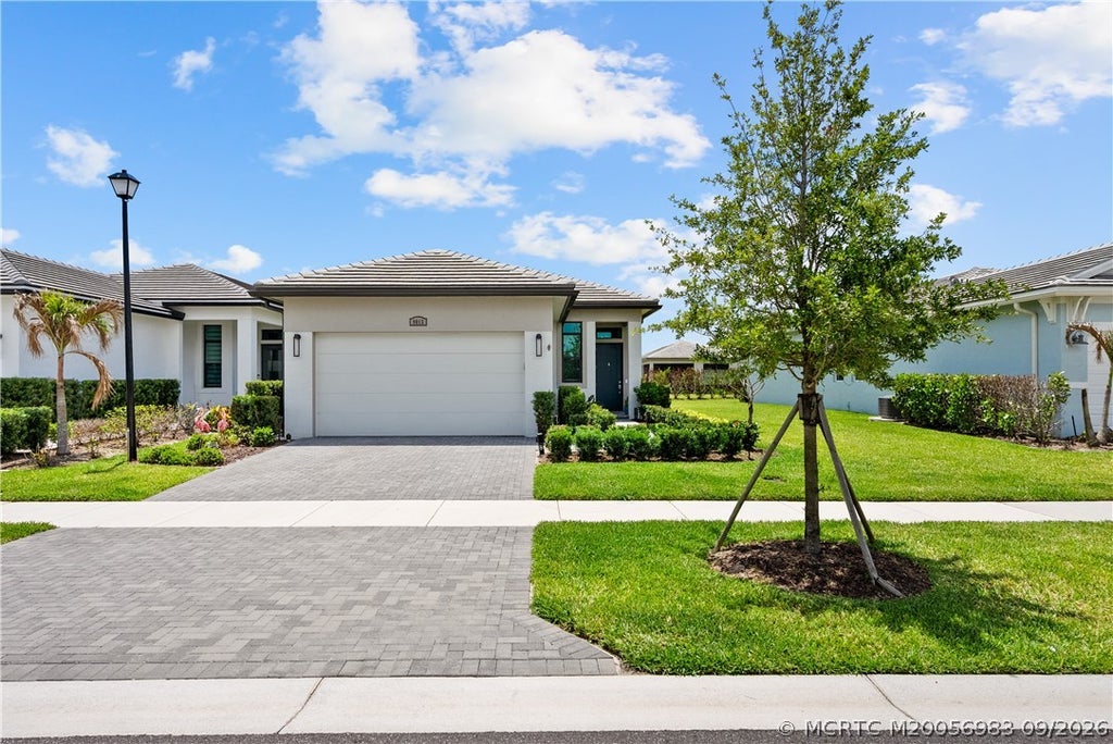 Photo of 9013 SW Vetta Way, Port Saint Lucie, FL 34987 (MLS # M20056983)