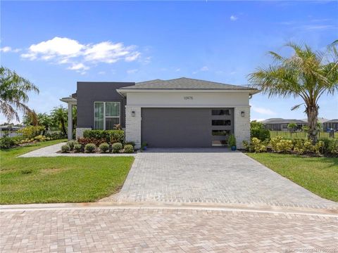 Photo of 10975 SW Magenta Lane, Port Saint Lucie, FL 34987 (MLS # M20051611)