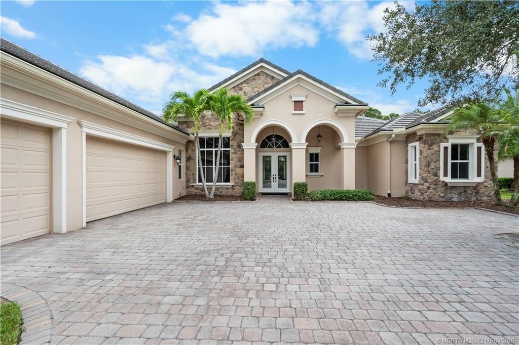 Photo of 5680 SW Pomegranate Way, Palm City, FL 34990 (MLS # M20052175)