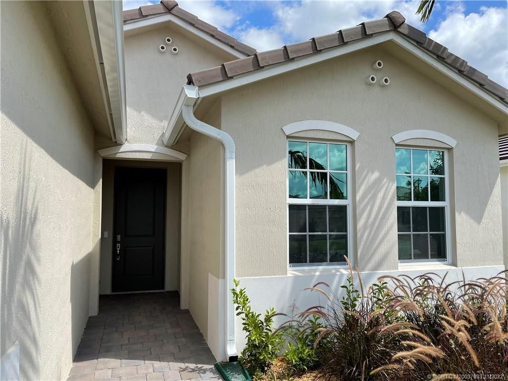 Photo of 4530 NW Exchange Avenue, Jensen Beach, FL 34957 (MLS # M20037033)