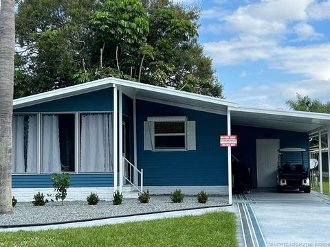 Photo of 16373 Indianwood Cir Center, Indiantown, FL 34956 (MLS # M20052796)