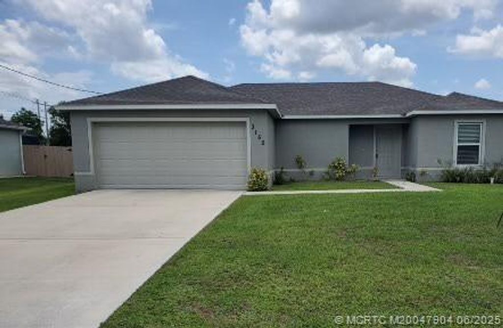 Photo of 3150 SW Centamino Street, Port Saint Lucie, FL 34953 (MLS # M20047904)