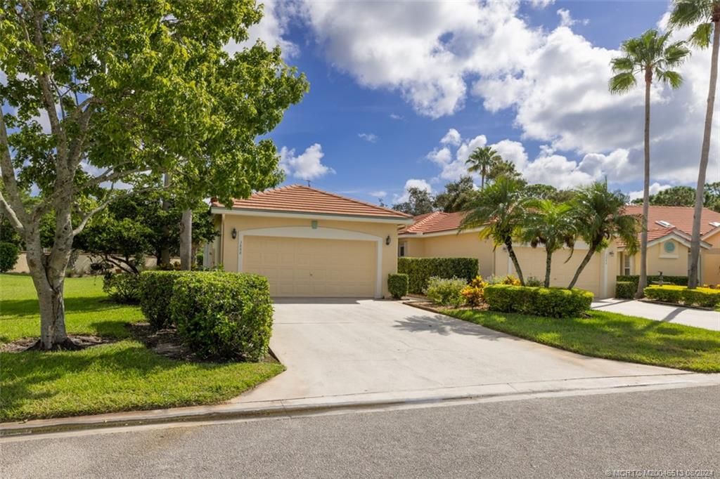 Photo of 3888 SW Whispering Sound Drive, Palm City, FL 34990 (MLS # M20046513)