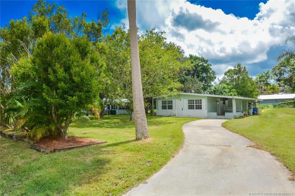 Photo of 1048 SW 30th Street, Palm City, FL 34990 (MLS # M20039640)