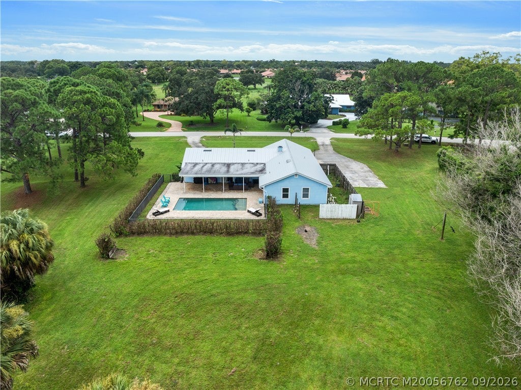 Photo of 3525 SW Racquet Club Way, Palm City, FL 34990 (MLS # M20056762)