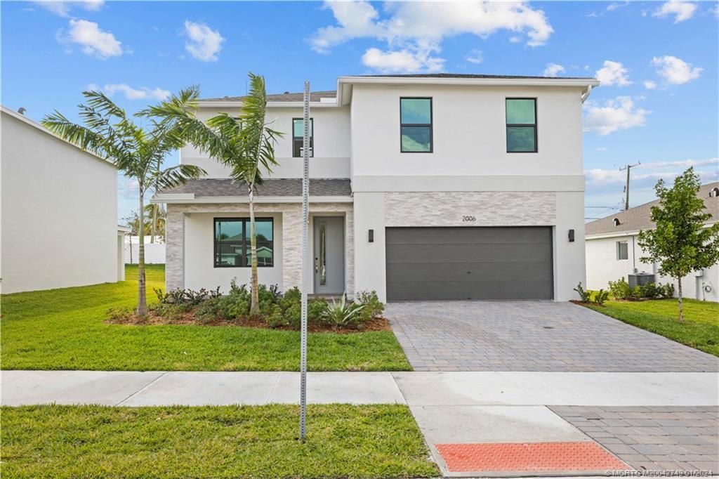 Photo of 2006 NE Ocean Dunes Drive, Jensen Beach, FL 34957 (MLS # M20042749)