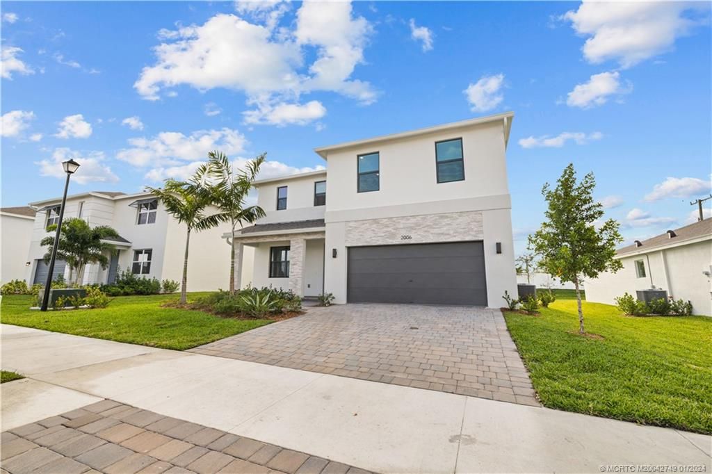 Photo of 2006 NE Ocean Dunes Drive, Jensen Beach, FL 34957 (MLS # M20042749)
