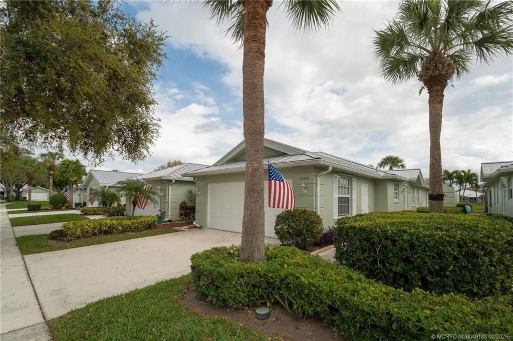 Photo of 1658 SW Waterfall Boulevard, Palm City, FL 34990 (MLS # M20049188)