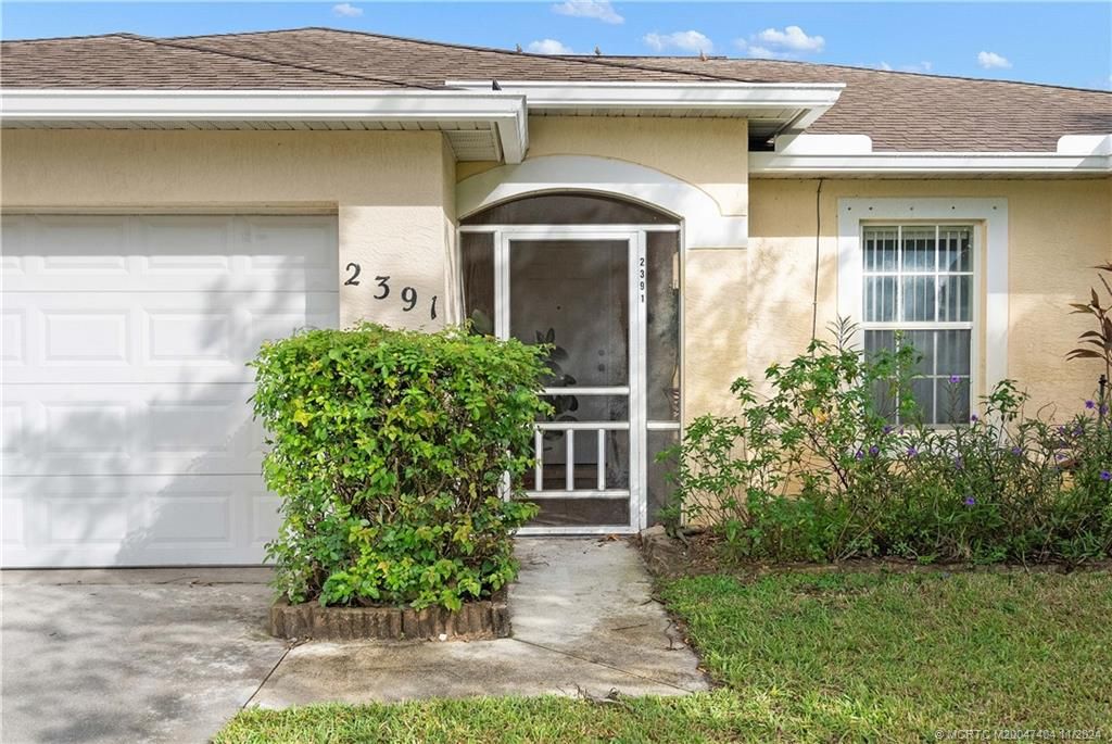 Photo of 2391 SE Marseille Street, Port Saint Lucie, FL 34952 (MLS # M20047404)