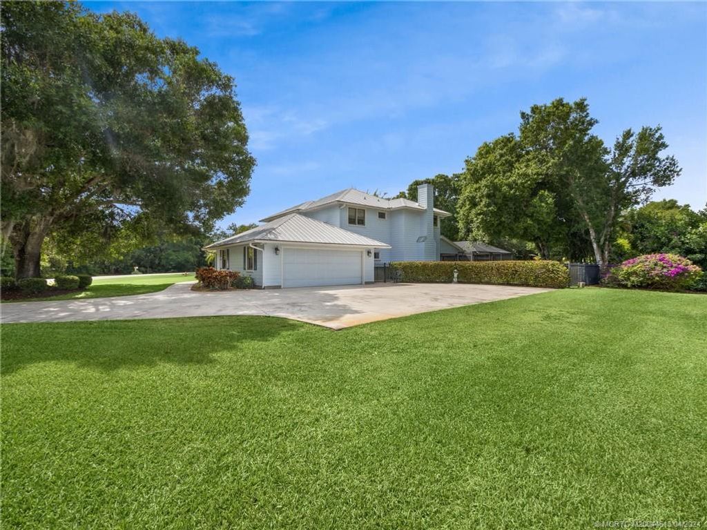 Photo of 1790 SW Crane Creek Avenue, Palm City, FL 34990 (MLS # M20044613)