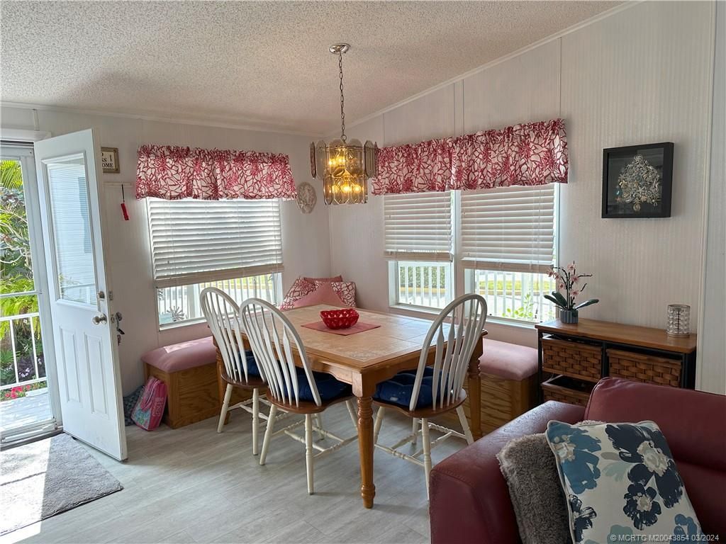 Photo of 2113 Nettles Boulevard, Jensen Beach, FL 34957 (MLS # M20043854)