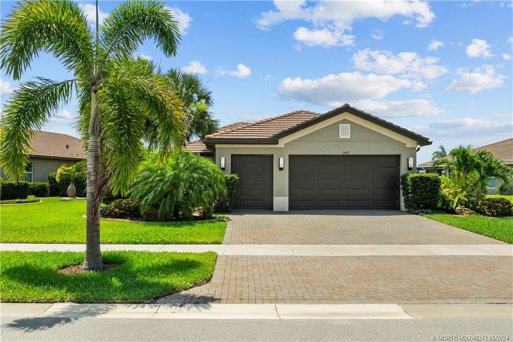Photo of 11402 SW Half Moon Lake Lane, Port Saint Lucie, FL 34987 (MLS # M20045212)