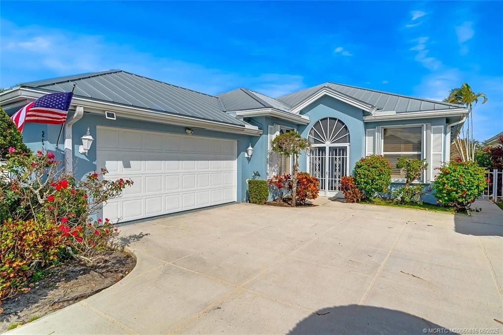 Photo of 2619 SW Greenwich Way, Palm City, FL 34990 (MLS # M20050885)