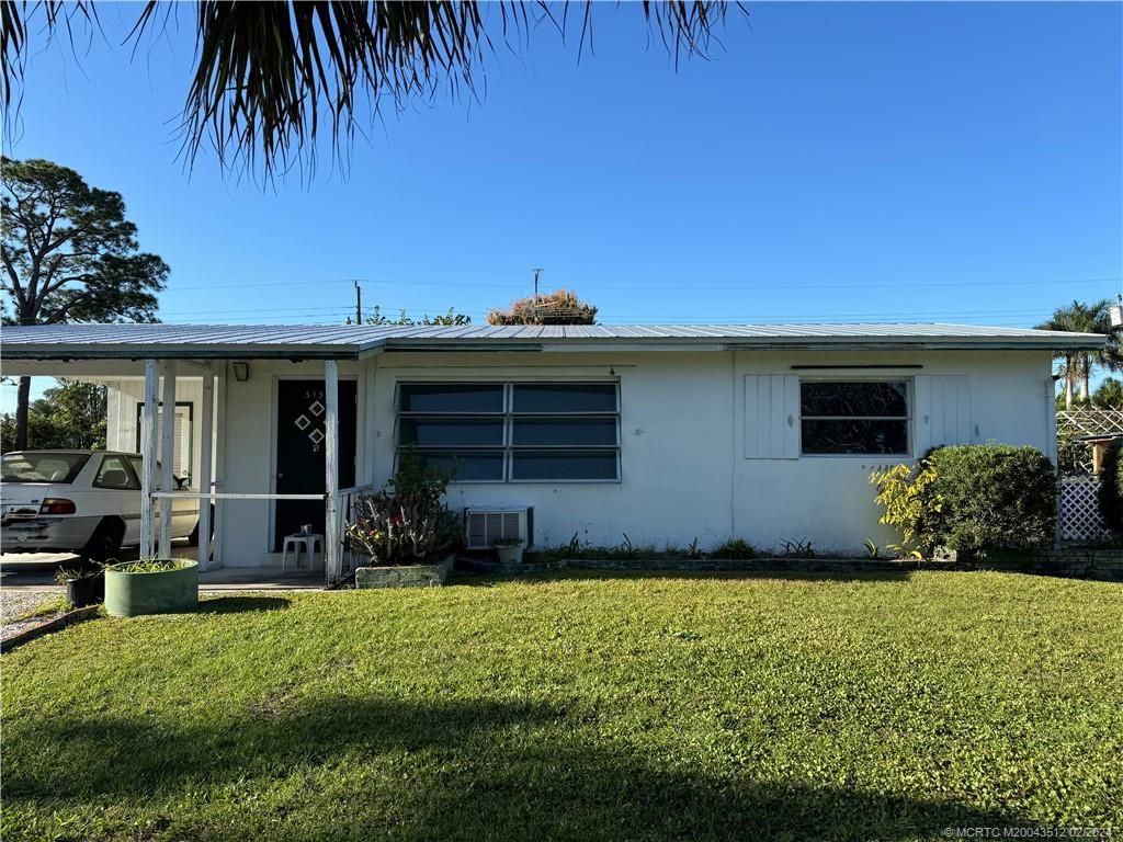 Photo of 3135 SE Mimosa Street, Stuart, FL 34997 (MLS # M20043512)