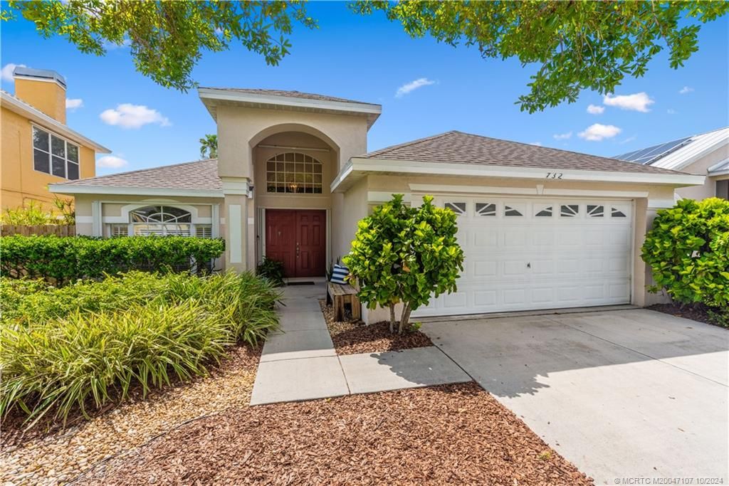 Photo of 732 NW Waterlily Place, Jensen Beach, FL 34957 (MLS # M20047107)